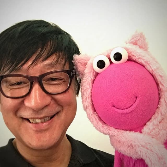 Manabu Nagaoka with Mana, the Manaboodle mascot