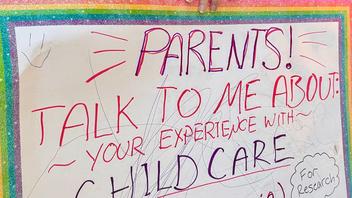 The sign asking parents to talk about their childcare experience